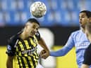 Vitesse's Dutch defender Danilho Doekhi (L) heads the ball during the Dutch Eredivisie football match between Vitesse Arnhem and PSV in the Gelredome stadium, on October 25, 2020 in Arnhem.