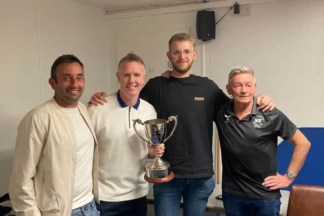 Joe Kendrick, second left, with Prudhoe Youth Club Seniors' promotion trophy.