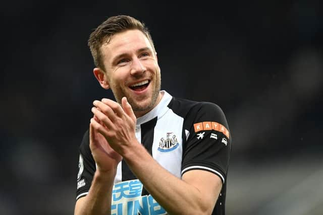 Paul Dummett applauds the fans after the Premier League match between Newcastle United and Aston Villa at St. James Park on February 13, 2022 in Newcastle upon Tyne, England. (Photo by Stu Forster/Getty Images)