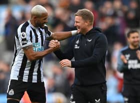 Newcastle United head coach Eddie Howe shares a joke with Joelinton after the Brentford win.