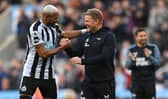 Newcastle United head coach Eddie Howe shares a joke with Joelinton after the Brentford win.