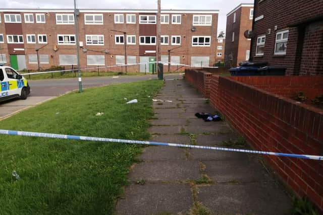 A Northumbria Police van remains at the scene in Napier Street, South Shields.