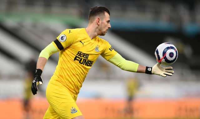 Newcastle goalkeeper Martin Dubravka kicks the ball upfield during the Premier League match between Newcastle United and Aston Villa at St. James Park on March 12, 2021 in Newcastle upon Tyne, England.