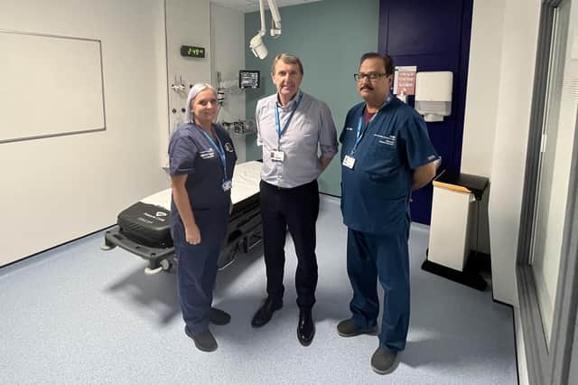 Department manager Julie Russell, Trust chief executive, Ken Bremner, and emergency medicine consultant, Sanjay Kumar, in one of the new rooms.