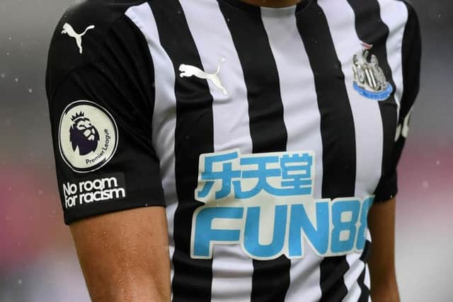 The No Room For Racism badge on a Newcastle United shirt during the Premier League match between Newcastle United and Southampton at St. James Park. (Photo by Gareth Copley/Getty Images)