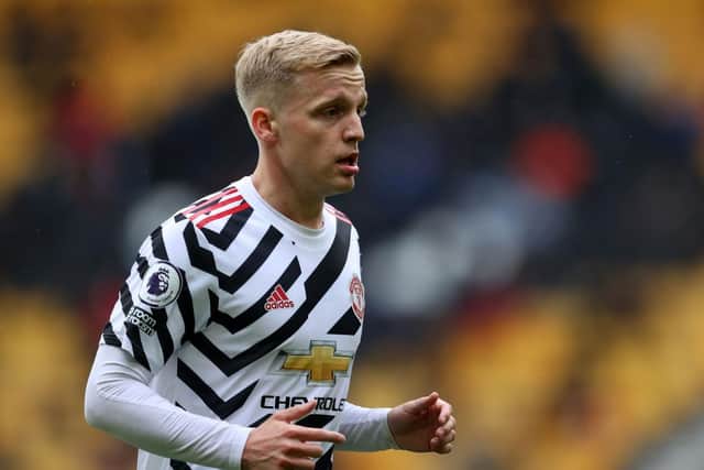 Manchester United's Donny van de Beek may 'snub' a move to Newcastle in order to fight for a place at Old Trafford under new management (Photo by Catherine Ivill/Getty Images)