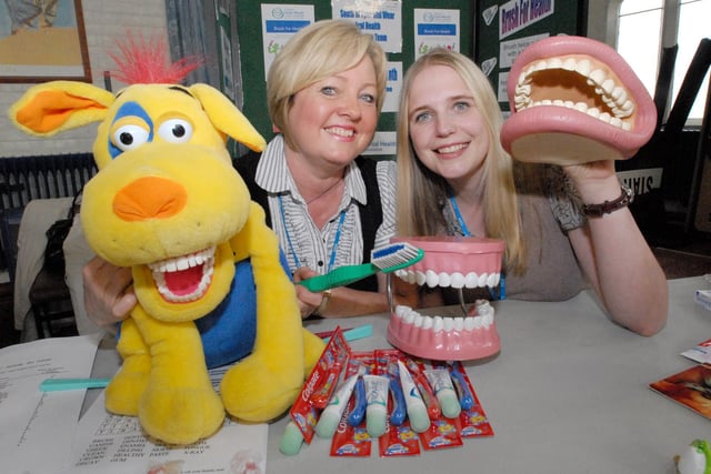 A family fun day at the Living Waters Church with plenty of smiles from the oral health team of Ann Leather and Victoria Dawson in 2009.