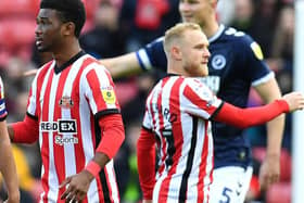 Amad Diallo and Alex Pritchard playing for Sunderland against Millwall.