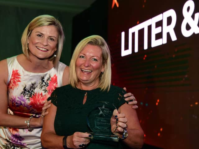 Litter & Laugh Walk founder Angela Todd (right) receives the 2019 Greener South Tyneside Award from Liz Davis, head of communications at the South Tyneside & Sunderland NHS Foundation Trust.