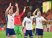 Declan Rice, Kobbie Mainoo and Luke Shaw celebrate after England beat the Netherlands during the UEFA EURO 2024 semi-final match.