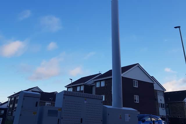 (l-r) Whiteleas ward councillors Bill Brady and Ernest Gibson beside the monopole development at Whiteleas Way, South Shields.