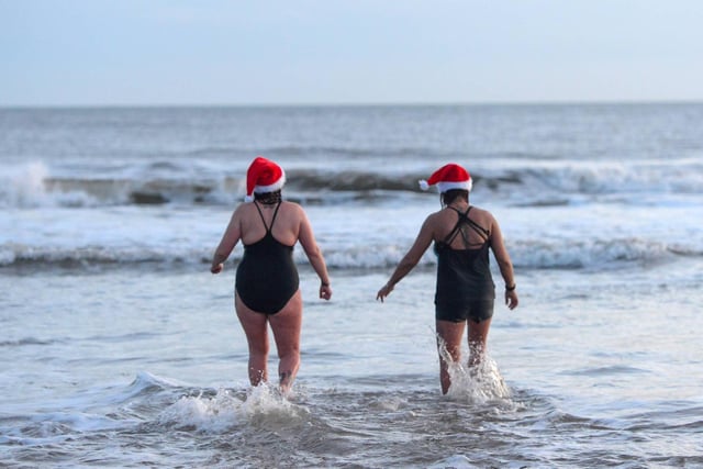 Enjoying Christmas morning on Sandhaven Beach in South Shields. Pictures by North News.:Enjoying Christmas morning on Sandhaven Beach in South Shields