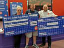 Jeff Short collecting his winnings at Buzz Bingo
