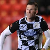 Gateshead player-manager Mike Williamson in action last season.