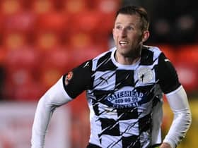Gateshead player-manager Mike Williamson in action last season.