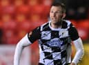Gateshead player-manager Mike Williamson in action last season.