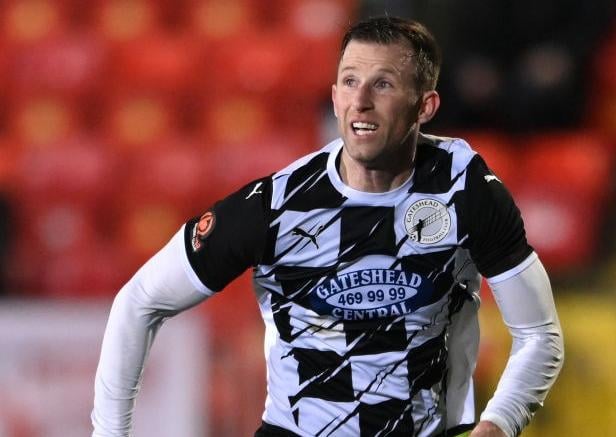 Gateshead player-manager Mike Williamson in action last season.