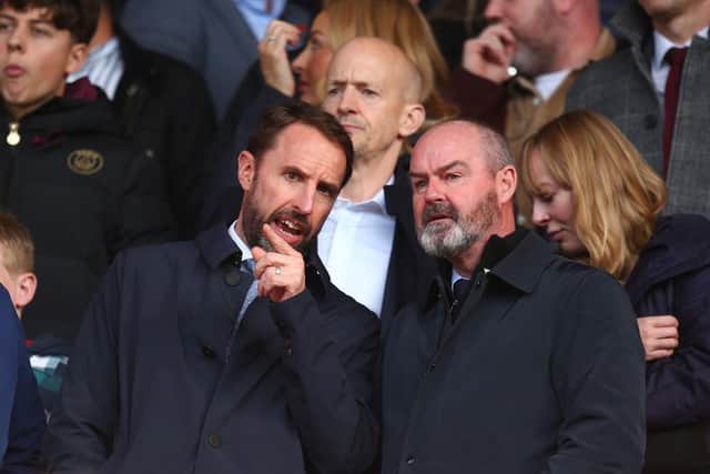 Gareth Southgate, Manager of England and Steve Clarke, Manager of Scotland look on from the stands prior to the Premier League match between Southampton FC and Newcastle United at Friends Provident St. Mary's Stadium on November 06, 2022 in Southampton, England. (Photo by Charlie Crowhurst/Getty Images)