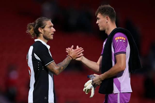 Dan Langley alongside Jeff Hendrick in action for Newcastle United.