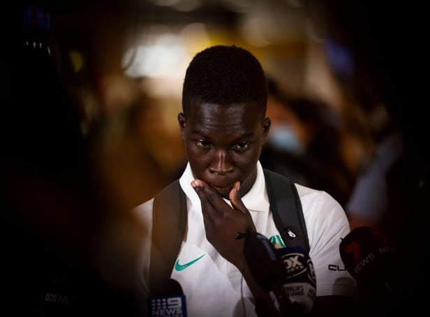 Newcastle United forward Garang Kuol speaking to the media in Australia last month.