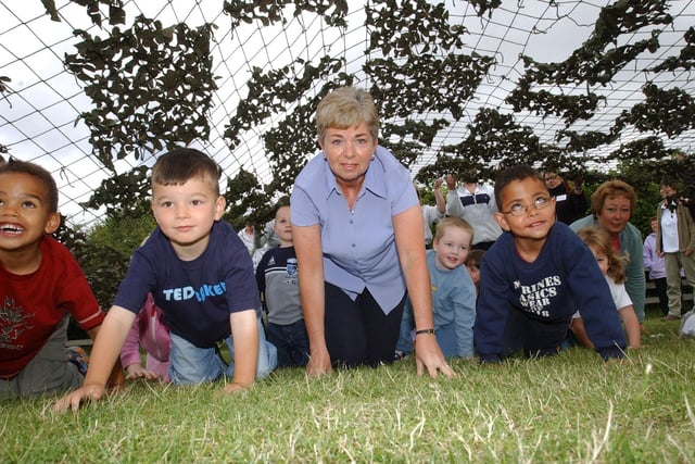 Nursery teacher Pat Camsey was leading these children through an assault course in 2003. Who can tell us more?