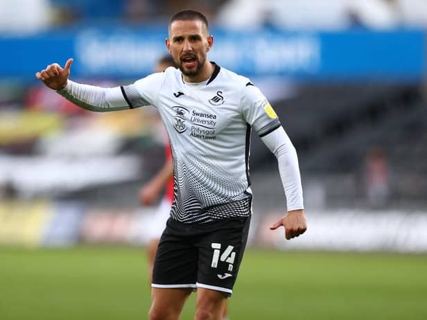 Conor Hourihane playing for Swansea City.