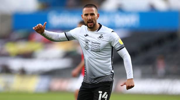 Conor Hourihane playing for Swansea City.