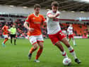 Dan Barlaser, right, playing for Rotherham United.
