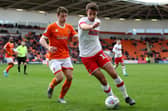 Dan Barlaser, right, playing for Rotherham United.