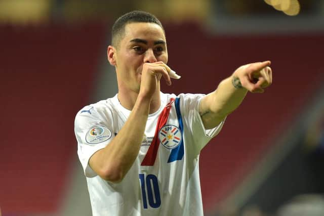 Miguel Almiron celebrates scoring against Chile.