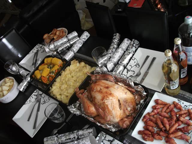 Pigs in blankets next to turkey in a space suit!
