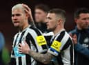 Bruno Guimaraes of Newcastle United is consoled by teammate Kieran Trippier following the Carabao Cup Final match between Manchester United and Newcastle United at Wembley Stadium on February 26, 2023 in London, England. (Photo by Eddie Keogh/Getty Images)