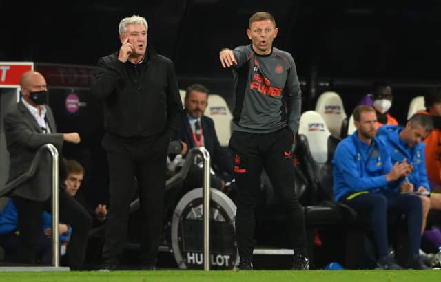 NEWCASTLE UPON TYNE, ENGLAND - OCTOBER 17: Newcastle manager Steve Bruce (l) with coach Graeme Jones on the touchline during the Premier League match between Newcastle United and Tottenham Hotspur at St. James Park on October 17, 2021 in Newcastle upon Tyne, England. (Photo by Stu Forster/Getty Images)