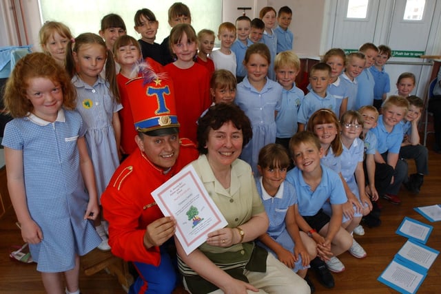 Retiring teacher Veronica Crawley was saying farewell to St Aloysius RC Infants School in 2003 and Tommy the Trumpeter joined her as she said goodbye to the pupils.