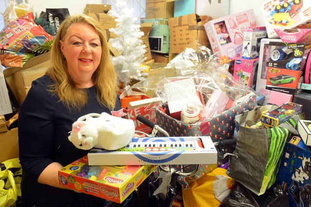 Hope 4 Kidz founder Viv Watts with some of the toys donated in last year's Christmas Toy Appeal.