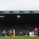 Newcastle United's Slovakian goalkeeper Martin Dubravka leads the Newcastle players out for the English Premier League football match between Leeds United and Newcastle United at Elland Road in Leeds, northern England on January 22, 2022. (Photo by Paul ELLIS / AFP) / RESTRICTED TO EDITORIAL USE. No use with unauthorized audio, video, data, fixture lists, club/league logos or 'live' services. Online in-match use limited to 120 images. An additional 40 images may be used in extra time. No video emulation. Social media in-match use limited to 120 images. An additional 40 images may be used in extra time. No use in betting publications, games or single club/league/player publications. /  (Photo by PAUL ELLIS/AFP via Getty Images)