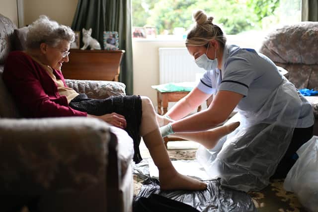 Families will be able to hug care home residents before Christmas as part of a new Government commitment. Photo: PA.