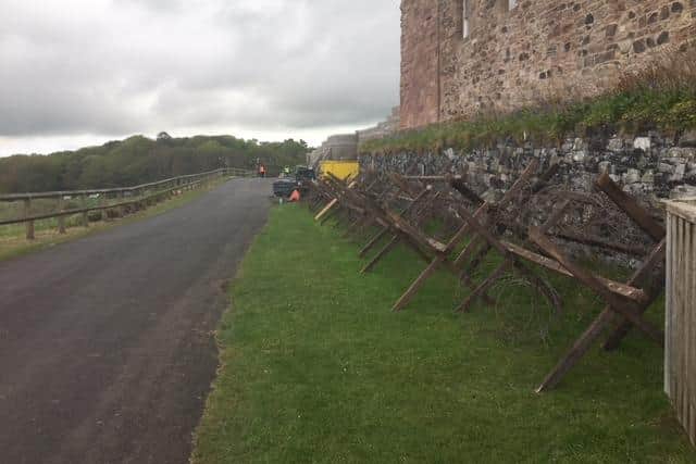 Props of barbed wire fences have been spotted at the tourist hotspot.