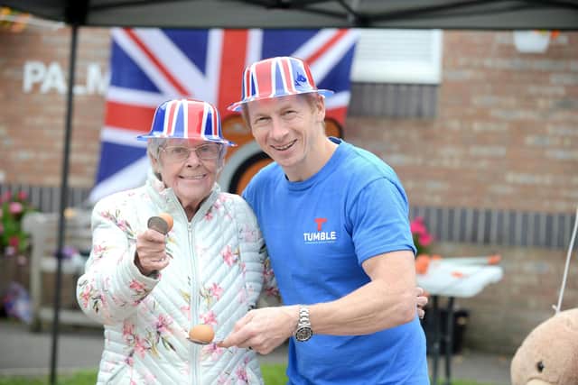 Palmersdene care home resident Libby Lamb and former Olympic gymnast Craig Heap take part in an Olympic fun day.