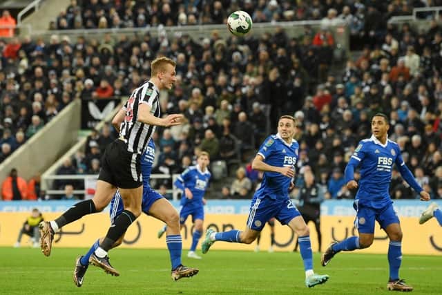 Dan Burn of Newcastle United heads the ball wide during the Carabao Cup Quarter Final match between Newcastle United and Leicester City at St James' Park on January 10, 2023 in Newcastle upon Tyne, England. (Photo by Stu Forster/Getty Images)