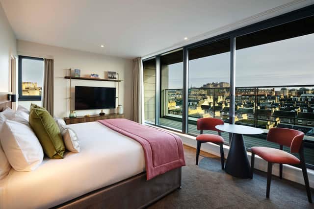 The Junior Suite offers a balcony view of Edinburgh Castle.