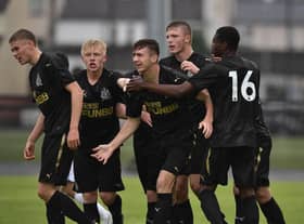 Oisin McEntee (C) of Newcastle United celebrates with team mates after opening the scoring with a header during the Super Cup NI u18 tournament group game between Newcastle United u18's and Komazawa University FC u18's at Scroggy Road on July 26, 2017 in Limavady, Northern Ireland. (Photo by Charles McQuillan/Getty Images)