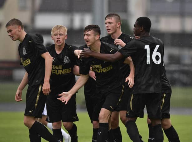 Oisin McEntee (C) of Newcastle United celebrates with team mates after opening the scoring with a header during the Super Cup NI u18 tournament group game between Newcastle United u18's and Komazawa University FC u18's at Scroggy Road on July 26, 2017 in Limavady, Northern Ireland. (Photo by Charles McQuillan/Getty Images)