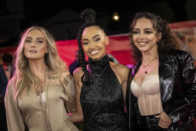 Perrie Edwards, from left, Leigh-Anne Pinnock and Jade Thirlwall of Little Mix pose for photographers upon arrival at the premiere of the film 'Boxing Day' in London, Tuesday, November 30, 2021. (Photo by Vianney Le Caer/Invision/AP)