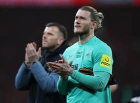 Newcastle United's German goalkeeper Loris Karius (R) applauds supporters on the pitch after the English League Cup final football match between Manchester United and Newcastle United at Wembley Stadium, north-west London on February 26, 2023. - Manchester United beat Newcastle 2-0 to win League Cup (Photo by ADRIAN DENNIS / AFP)