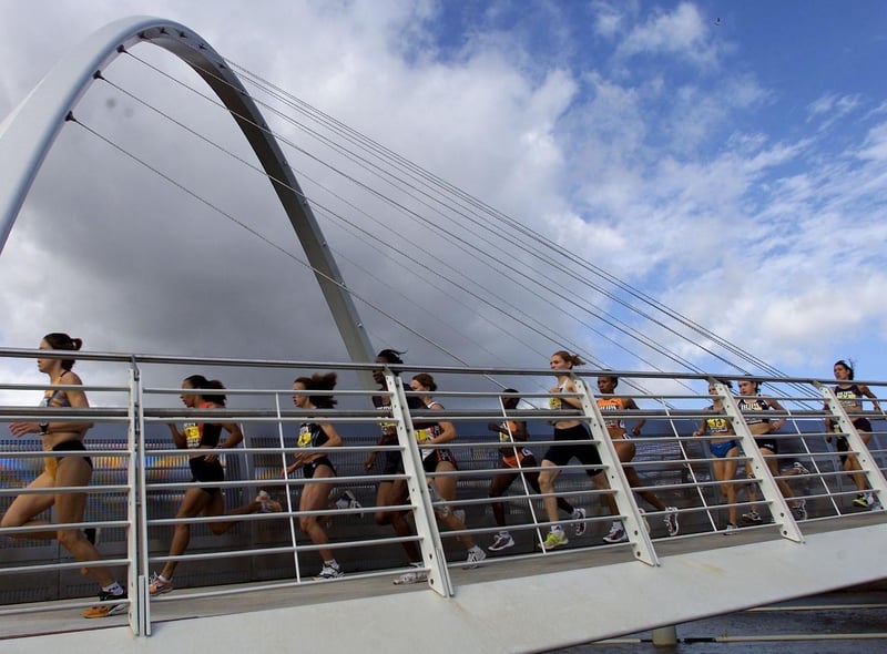 Here is a fantastic image from 2001, when the Women's Elite Race crossed the Millennium Bridge ahead of the Great North Run.