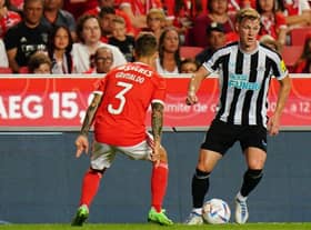 Emil Krafth of Newcastle United FC with Alex Grimaldo of SL Benfica in action during the Eusebio Cup match between SL Benfica and Newcastle United at Estadio da Luz on July 26, 2022 in Lisbon, Portugal.  (Photo by Gualter Fatia/Getty Images)