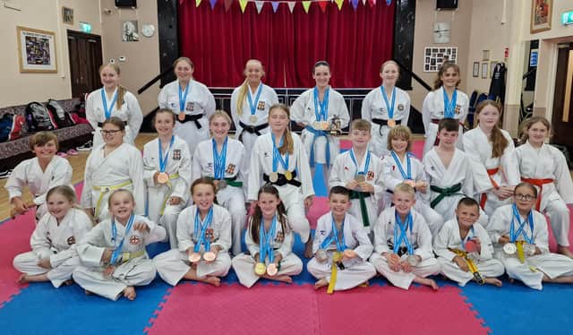 Some of the Dokan world championship squad with their medals.