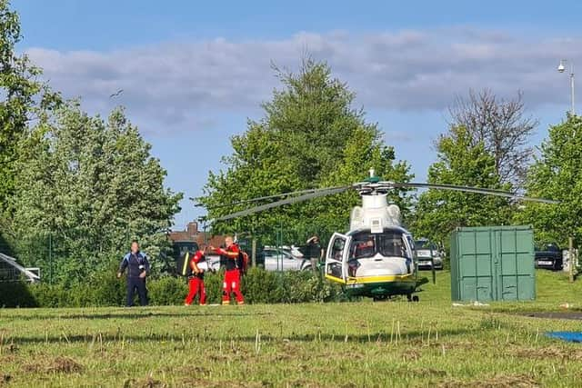 The Great North Air Ambulance landed at Harton Academy to assist with a 'medical incident'. Photo: Alan Hall.