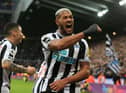 Newcastle United's Brazilian striker Joelinton (centre right) celebrates after scoring their third goal during the English Premier League football match between Newcastle United and Aston Villa at St James' Park in Newcastle-upon-Tyne, north east England on October 29, 2022. (Photo by LINDSEY PARNABY/AFP via Getty Images)